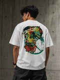 White oversized t-shirt with vibrant dragon and floral back print, streetwear style
