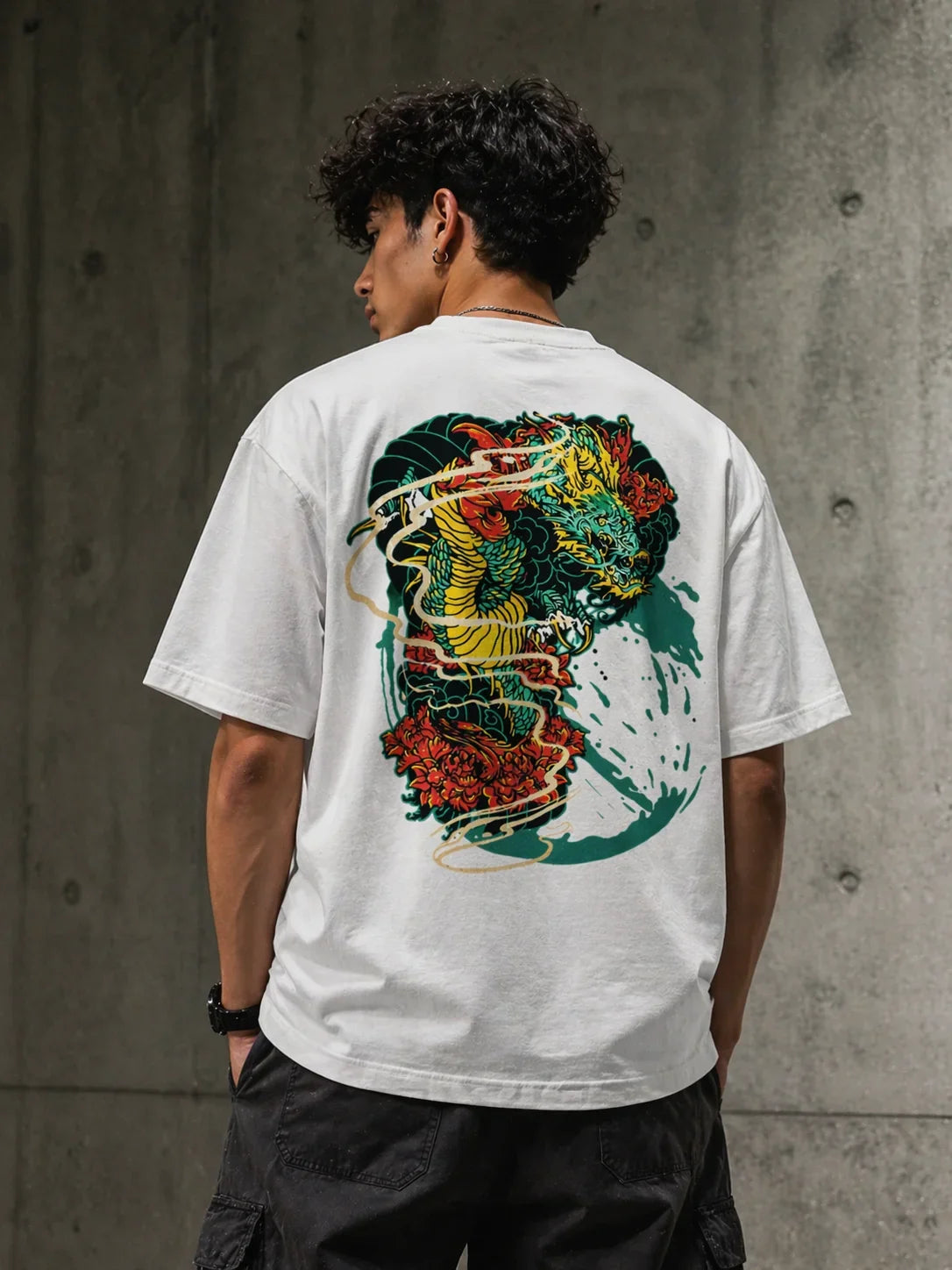 White oversized t-shirt with vibrant dragon and floral back print, streetwear style