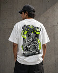 White oversized t-shirt with graffiti-style graphic of a character holding spray cans, urban street art design